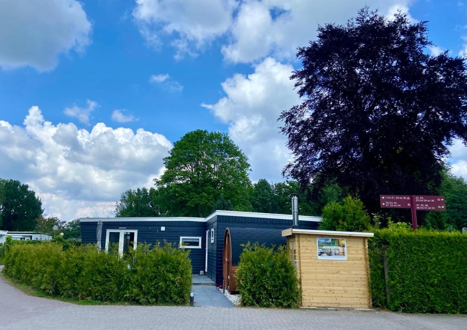 Veluwe Vakanties: Chalet Retreat with Private Sauna in National Park Putten Exterior photo